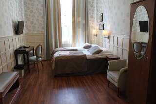 Отель Hotel Kruunupuisto Пункахарью Улучшенный двухместный номер с 2 отдельными кроватями-1